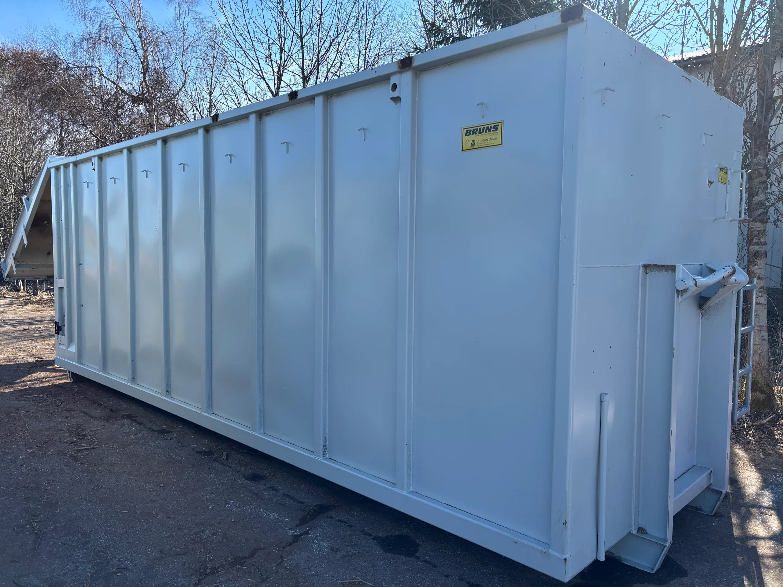 Conteneur à fond mouvant